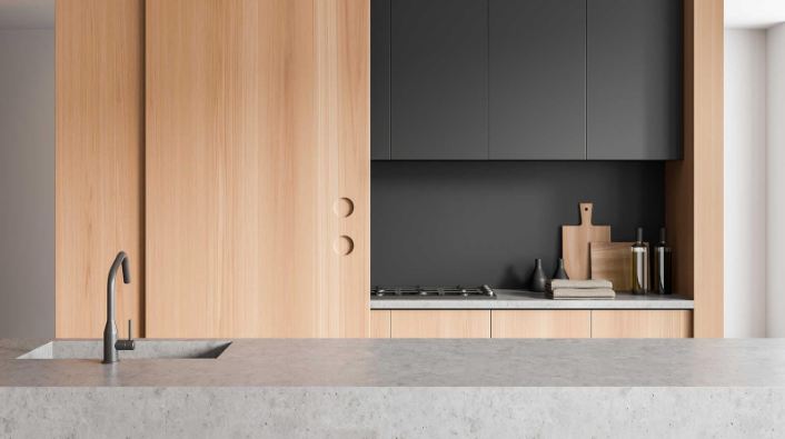 kitchen interior featuring a quartz bar island as a quartz kitchen countertop idea